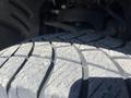 Close-up of a tire tread on a 2013 Ford Expedition showing detailed grooves and patterns