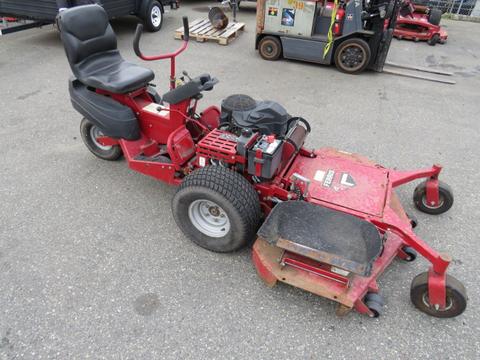 A red 2017 Ferris Rotary lawn mower with a seat and large rear tires features a cutting deck and visible engine components