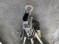 A 2014 Express 8 Foot Trailer hitch with a metal coupler and chains connected to a wiring harness