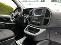 Interior view of a 2023 Mercedes-Benz Metris showcasing the driver's seat steering wheel and dashboard with a touchscreen display and controls