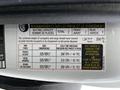 A vehicle information label from a 2018 Mercedes-Benz Metris detailing tire specifications and weight capacity