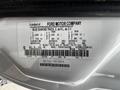 A 2013 Ford F-650 vehicle identification label detailing specifications and manufacturing information