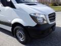 2016 Mercedes-Benz Sprinter van with a white exterior and black front bumper displaying the trademark grille and headlights
