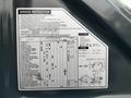 Service instruction label on a 2022 Hyundai R55-9A excavator detailing maintenance tasks and intervals