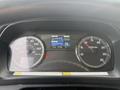 Dashboard of a 2017 Hino 338 displaying speedometer, tachometer, digital screen with date, time, and vehicle information