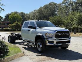 2022 RAM 5500 truck chassis in white with chrome details and a black grille positioned at an angle