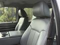 The image shows the interior of a 2011 Ford F-350 SD featuring leather seats with a center console and headrests in a gray color