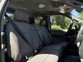 Interior view of a 2020 Ford F-350 SD truck showing front seats with seat belts and a gray fabric upholstery