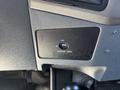 A switch panel featuring a button labeled for the passenger airbag with settings for on and off