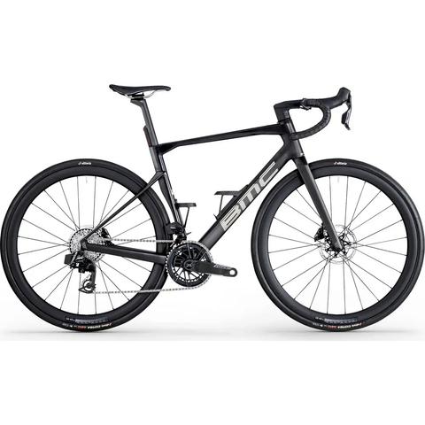 A black 2026 BMC Roadmachine 01 THREE road bike featuring a lightweight frame disc brakes and aerodynamic design with carbon wheels and a modern gear setup