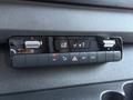 Control panel with buttons for air conditioning settings and temperature display in a 2019 Mercedes-Benz Sprinter