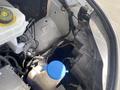 2024 Mercedes-Benz Sprinter engine compartment showing components like the coolant reservoir and various mechanical parts
