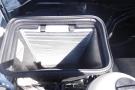 An engine air filter located inside a housing in a 2012 Mercedes-Benz Sprinter with visible pleated filter material