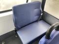 A blue fabric seat with a seatbelt designed for a Chevrolet Express vehicle