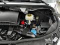 2020 Mercedes-Benz Sprinter engine compartment showcasing the air intake system and fluid reservoirs