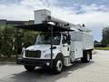 A white 2020 Freightliner M2 bucket truck with a large elevated work platform mounted above the cabin and a service body with storage compartments