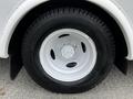 Close-up of a white alloy wheel with a Michelin tire on a 2016 Ford Econoline