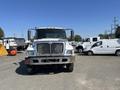 A 2007 International 7300 truck viewed from the front with a chrome grille and large headlights