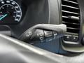 Close-up of the control stalk in a 2022 Ford Transit featuring various settings for windshield wipers and turn signals