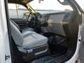 Interior view of a 2012 Ford F-250 showing leather seats dashboard and controls