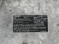 2018 Isuzu NRR engine label displaying important engine information including engine family and specifications
