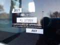A 2014 International Durastar with a sticker displaying a certificate of approval from British Columbia for July 2021 with the number FL 27359
