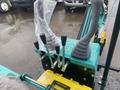 Control panel of a 2024 AGT Industrial MH12R Mini Excavator featuring levers and joysticks for operation