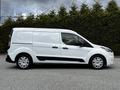 A white 2019 Ford Transit Connect van with side windows and a black stripe along the lower body, featuring a curved shape and five wheels