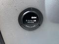 A close-up of an hour meter on a dashboard displaying 01967 hours indicating usage on a 2015 Ford F-750