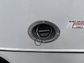 Close-up of the fuel filler cap on a 2020 Chevrolet Express with a metal ring attached