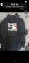 A black hoodie featuring the text "FULL CONTACT FIGHTER" and an image of a fighter icon on the front