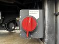 A red rotary switch labeled Crane Master Disconnect with off and on positions