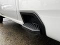 A close-up of the side step of a 2021 Chevrolet Silverado 3500HD featuring a textured surface for better traction