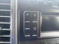 Dashboard controls of a 2017 Ford F-550 with buttons for CD radio Sirius media phone and menu