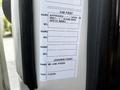 A label on a 2012 Autocar Xpert detailing paint specifications and approval information for cab and chassis paints