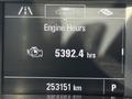 A 2018 GMC Canyon dashboard display showing engine hours at 5392.4 and mileage at 253151 km