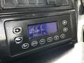 Control panel of a 2012 Autocar Xpert featuring buttons for temperature settings and ventilation controls with a digital display showing the letter "OFF"