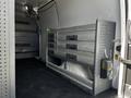 Interior view of a 2017 Mercedes-Benz Sprinter van showing a metal storage unit with multiple drawers along one side of the cargo area