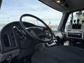 Interior view of a 2016 Freightliner 108SD featuring a steering wheel control panel and dashboard with various buttons and levers