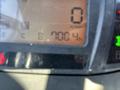 Display screen of a 2010 Kubota F3990 showing an engine RPM of 0 and an hour meter reading of 700.4 hours