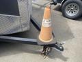 A 2020 Stealth Enterprises Trailer with an orange traffic cone placed on the hitch coupler