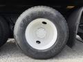 A white wheel with a black tire marked Good Year RSD G622 on a 2016 International 7600 truck