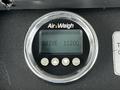 Close-up of an Air-Weigh digital display mounted on a black surface showing the word DRIVE and the number 11200