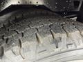 Close-up of a rugged tire tread from a 2020 Chevrolet Express showing detailed patterns designed for traction and durability