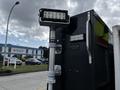 A 2007 Ford F-550 with an attached light bar mounted on the rear side of the vehicle