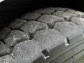 Close-up of a rugged tire tread showing deep grooves and surface texture designed for traction and stability on various terrains