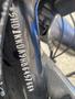 Close-up of a black 2017 Harley-Davidson FLHTKL motorcycle frame showing embossed vehicle identification number details