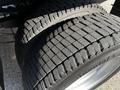 Close-up of dual tires on a 2021 Ford F-550 showing detailed tread design and Continental branding