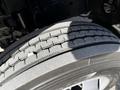 Close-up of a 2017 Hino 155 tire featuring an intricate tread pattern with even wear and depth visible on the rubber surface