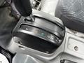 Close-up of the gear shift lever from a 2014 Hino 195 mostrando positions P R N D 4 and 3 on a black control panel